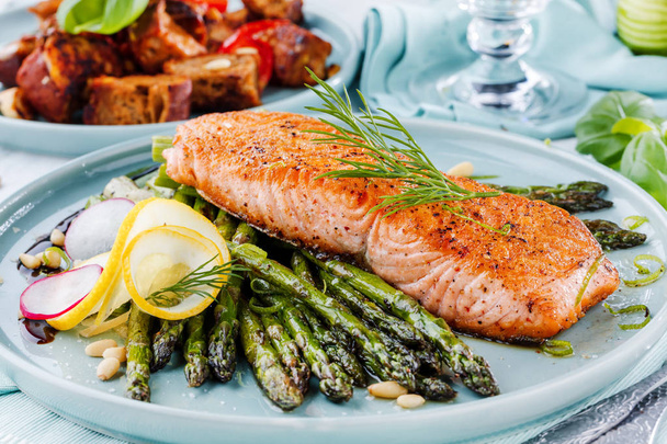Grilled salmon and asparagus close up - Photo, Image