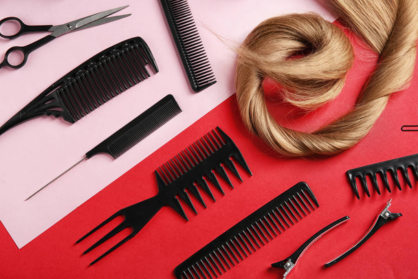 Flat lay composition with hair salon tools on color background - Φωτογραφία, εικόνα
