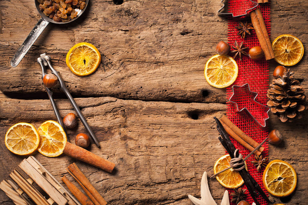 Christmas wooden background with spices - 写真・画像