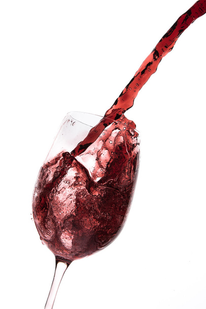 pouring red wine - Foto, Bild