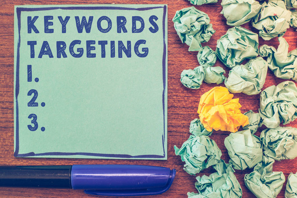 Conceptual hand writing showing Keywords Targeting. Business photo showcasing Use Relevant Words to get High Ranking in Search Engines - Photo, Image