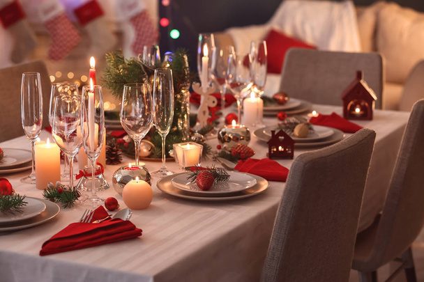 Stylish table setting with burning candles and Christmas decorations - Photo, Image
