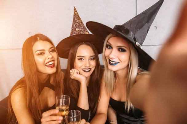 Spooky female friends posing on the selfie - Фото, зображення