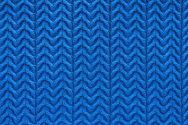 cornice completa di tessuto di lana blu scuro con motivo come sfondo
 - Foto, immagini