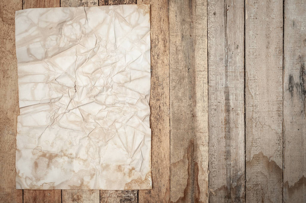 Vintage Crumpled paper texture on wooden table - Photo, Image