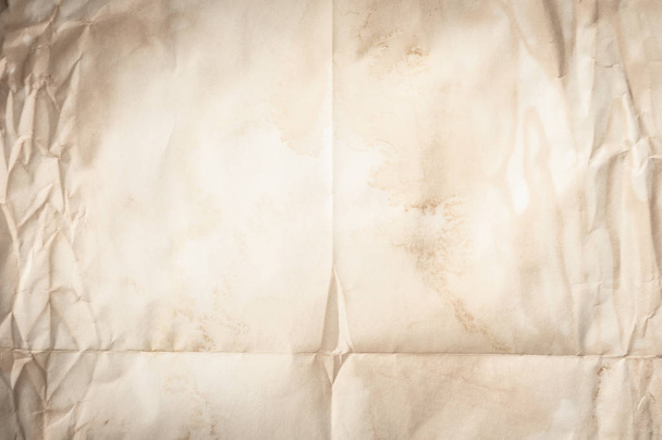 Background texture of crumpled aged paper with spot and stain - Фото, зображення