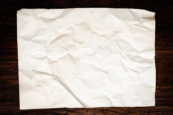 Background texture of crumpled aged paper with spot and stain - Photo, image