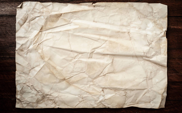 Background texture of crumpled aged paper with spot and stain - Фото, изображение