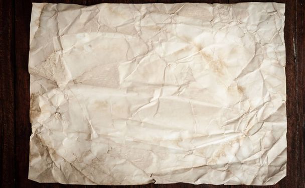 Background texture of crumpled aged paper with spot and stain - Фото, зображення