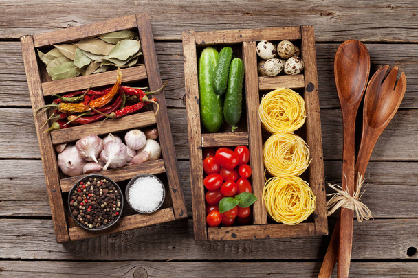 Cooking ingredients. Pasta, vegetables and spices. Top view - Foto, Imagen