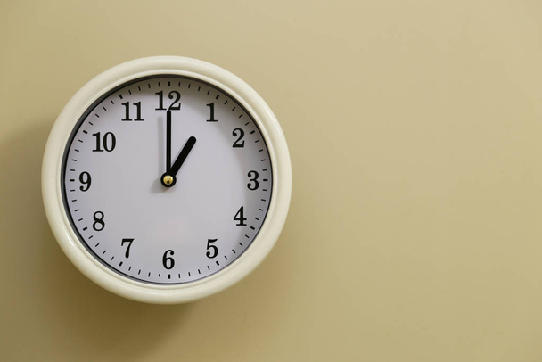 Wall analog clock time is 1 o`clock - Photo, Image