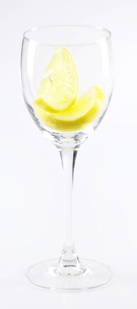 wineglasses with lemon slices isolated on white background, close-up  - 写真・画像