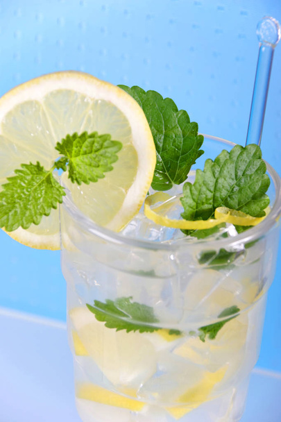 cocktail with mint leaves and lemon slices in glass, close-up   - Photo, Image