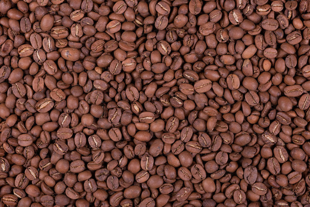 Roasted arabica coffee beans background or texture - Foto, Imagem