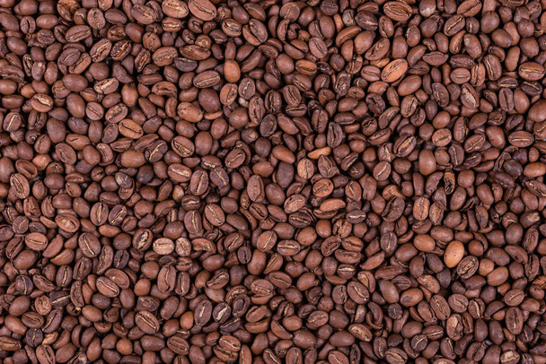 Roasted arabica coffee beans background or texture - Foto, Bild