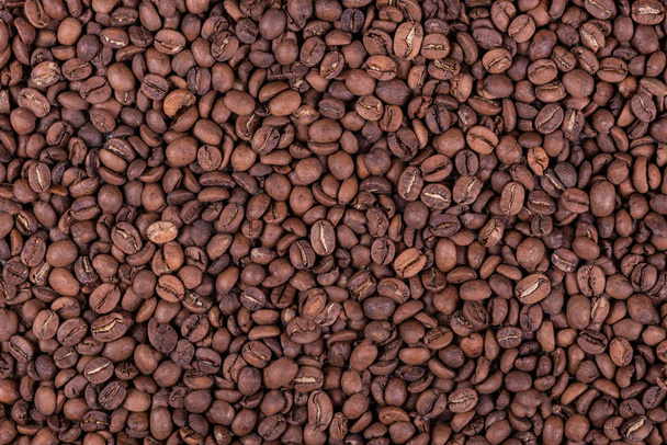 Roasted arabica coffee beans background or texture - Foto, Bild