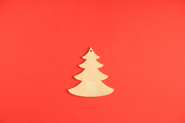 close-up view of decorative fir tree symbol on red background  - Photo, Image