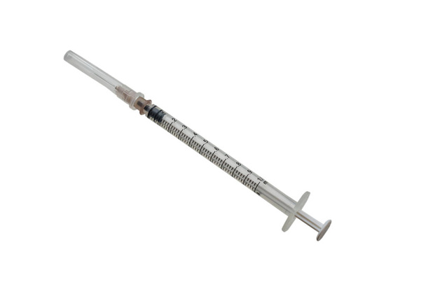 Medical syringe closeup on white background isolated. The selected path. - Photo, image