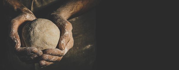 Hands of unrecognizable cook holding sphere of knead while cooking - Foto, immagini
