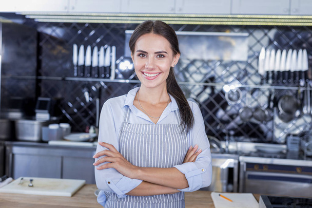 Beautiful attractive woman posing in the kitchen - Fotoğraf, Görsel