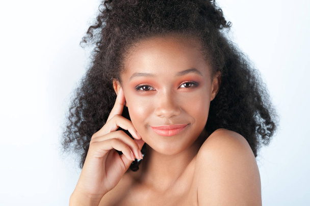 Young beautiful black girl with clean perfect skin close-up. Beauty portrait - Photo, Image
