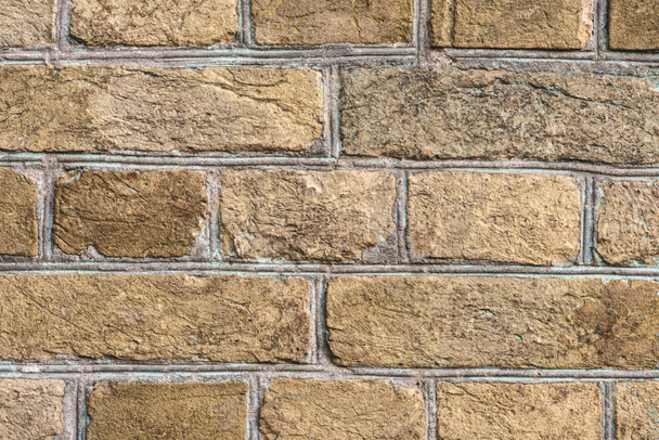 brown grungy brick wall with sunlight - Valokuva, kuva
