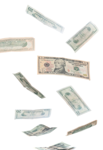 Klesající amerických dolarů izolované na bílém - Fotografie, Obrázek