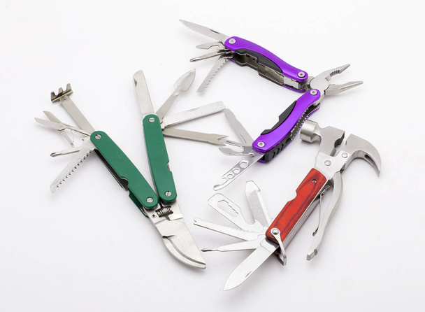 fully unfolded multitool isolated on white background - Foto, afbeelding