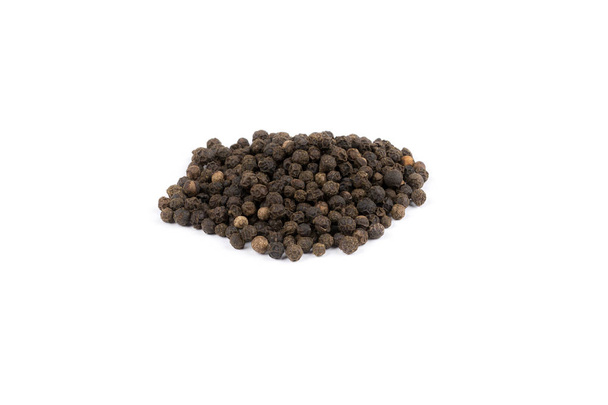 Black pepper on a white background - Photo, Image