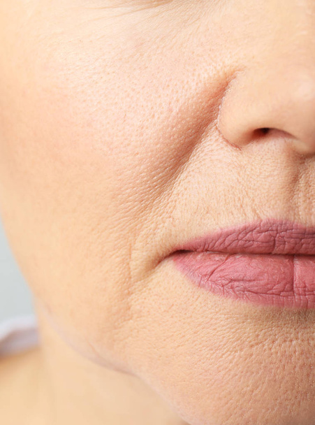 Beautiful older woman, closeup of lips - Фото, изображение