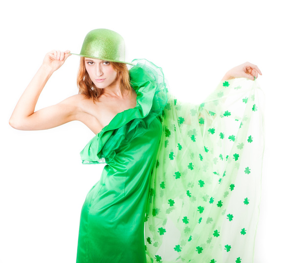 Beautiful Woman in Green and a shower of Shamrocks in March - Фото, изображение