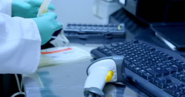 Laboratory technician using barcode scanner in blood bank 4k - Záběry, video
