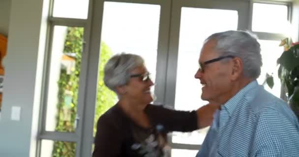 Romantic senior couple dancing at home 4k - Filmati, video