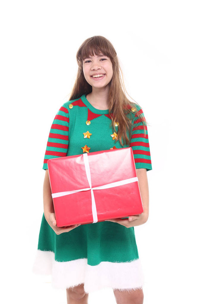 Beautiful teenage girl with christmas gift - Foto, imagen