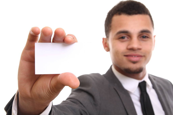 Black businessman showing a white card - Foto, Bild