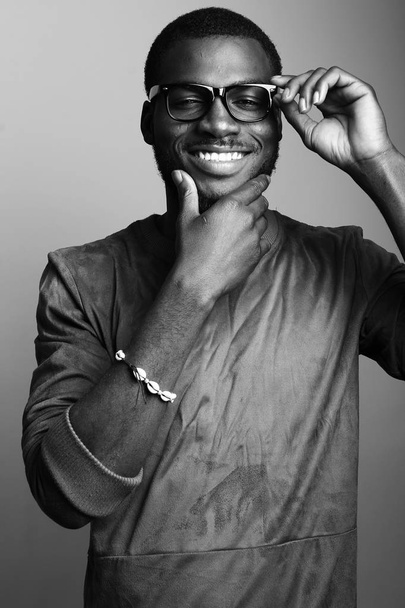 Smiling african man on black and white tone - Foto, Imagem