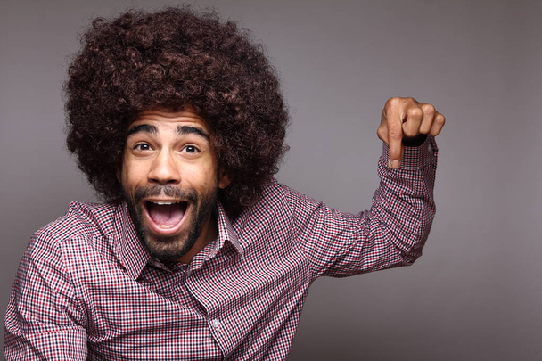 Screaming black man with big hair  - Фото, зображення