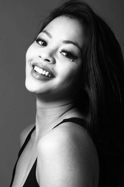 Smiling asian young woman on black and white tone - Zdjęcie, obraz