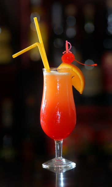 It is red - an orange cocktail - Photo, image