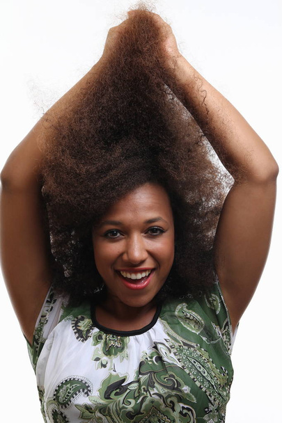 Beautiful afro-american woman is smiling - Фото, изображение