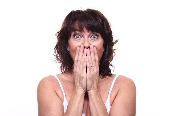 Surprised adult woman on white background - Photo, image