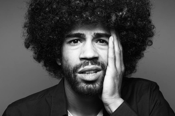 Surprised black man on black and white tone - Photo, Image