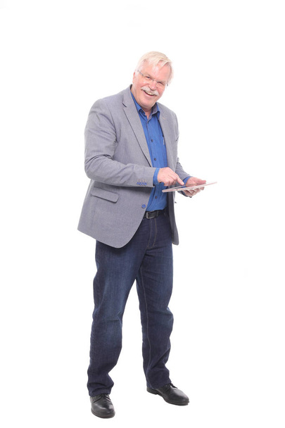 Old caucasian man is using tablet PC - Photo, Image