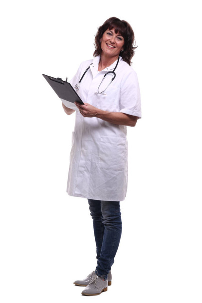 Happy female doctor writing information about a something - Foto, imagen
