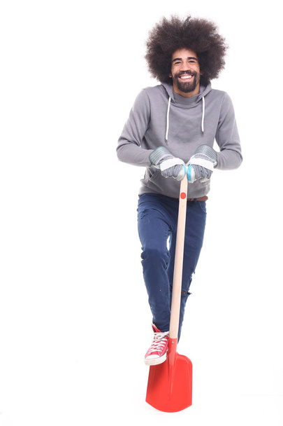 Black man holding shovel on white background - Photo, Image