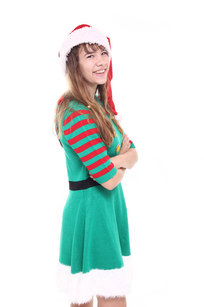 Beautiful teenage girl in christmas clothes - Photo, image