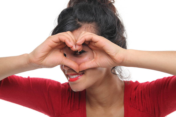 Beautiful afro-american woman is showing heart sign - 写真・画像