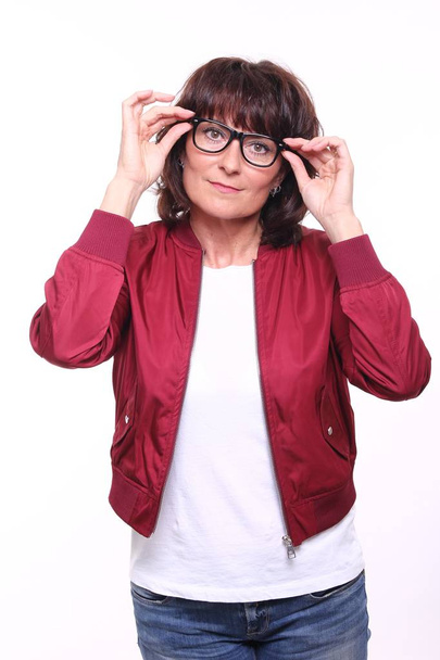 Beautiful adult woman in glasses on white background - Foto, afbeelding
