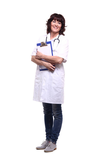 Happy female doctor with stethoscope and folder - 写真・画像