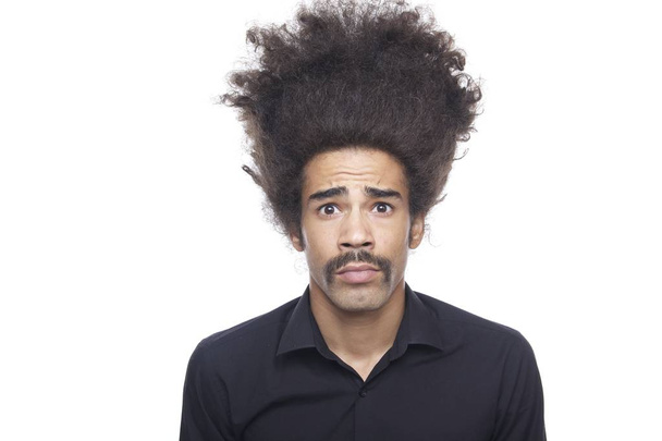 Surprised black man with big hair - Foto, Imagen